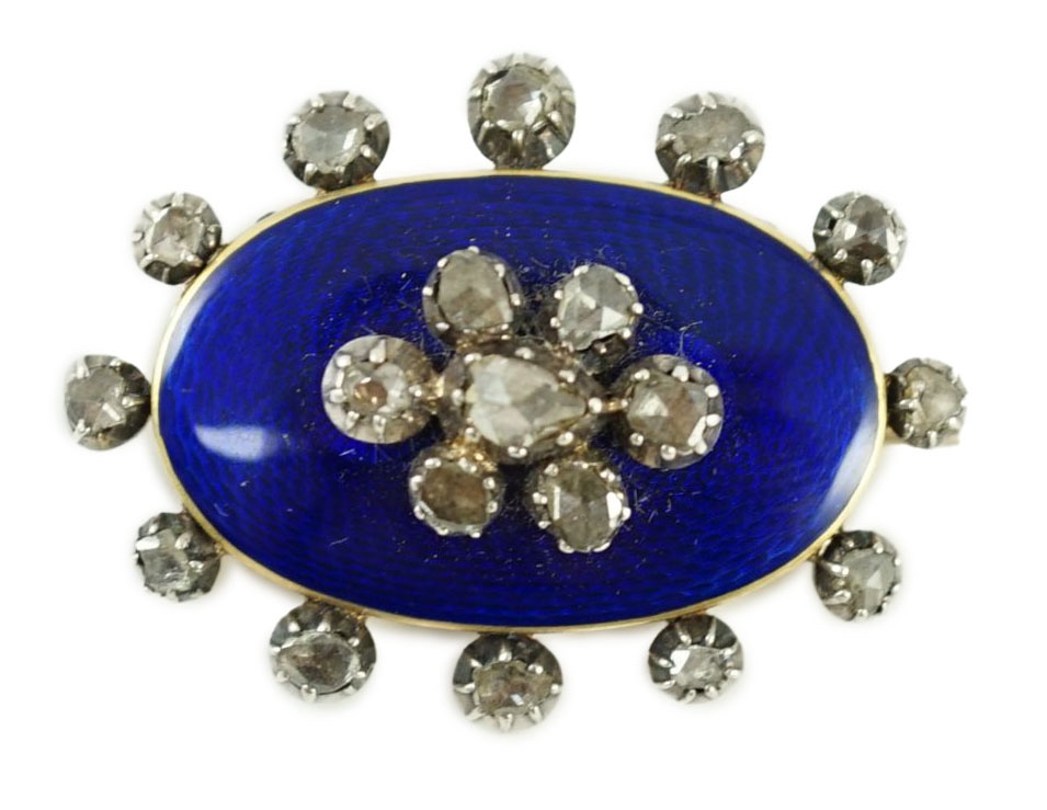 A 19th century gold, blue enamel and rose cut diamond set oval brooch